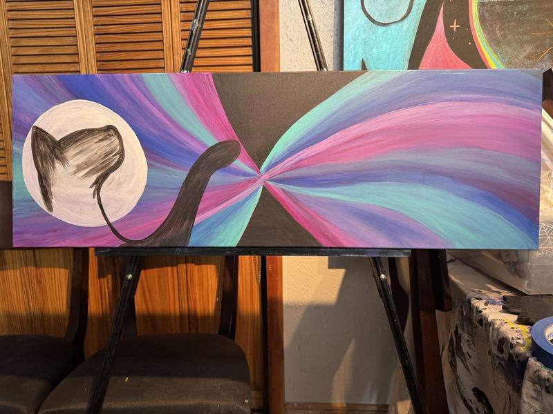Work in progress of a wide acrylic painting of a black cat silhouette against a white moon, with pink, teal and purple light streaming past