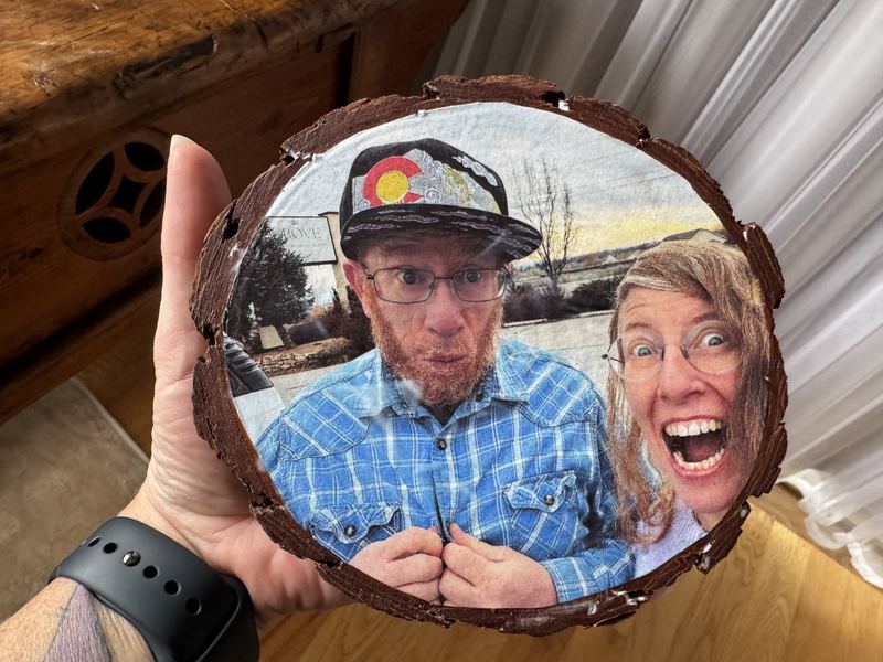 Wood round with a color photo of Rachel and her brother