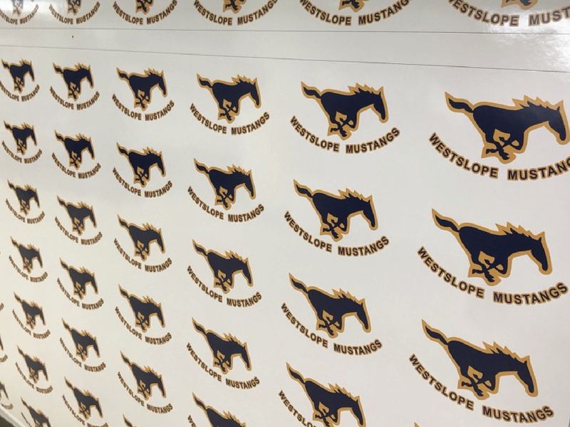 Sheet of Westslope Mustangs decals, a navy and gold running mustang above a curved team name, repeated in rows